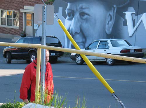 Shawn McInnis mural and passerby -  Churchill street and Richmond road