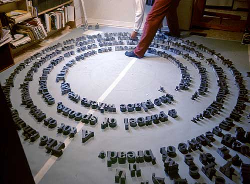 nearly 400 letters made of concrete on my kitchen floor